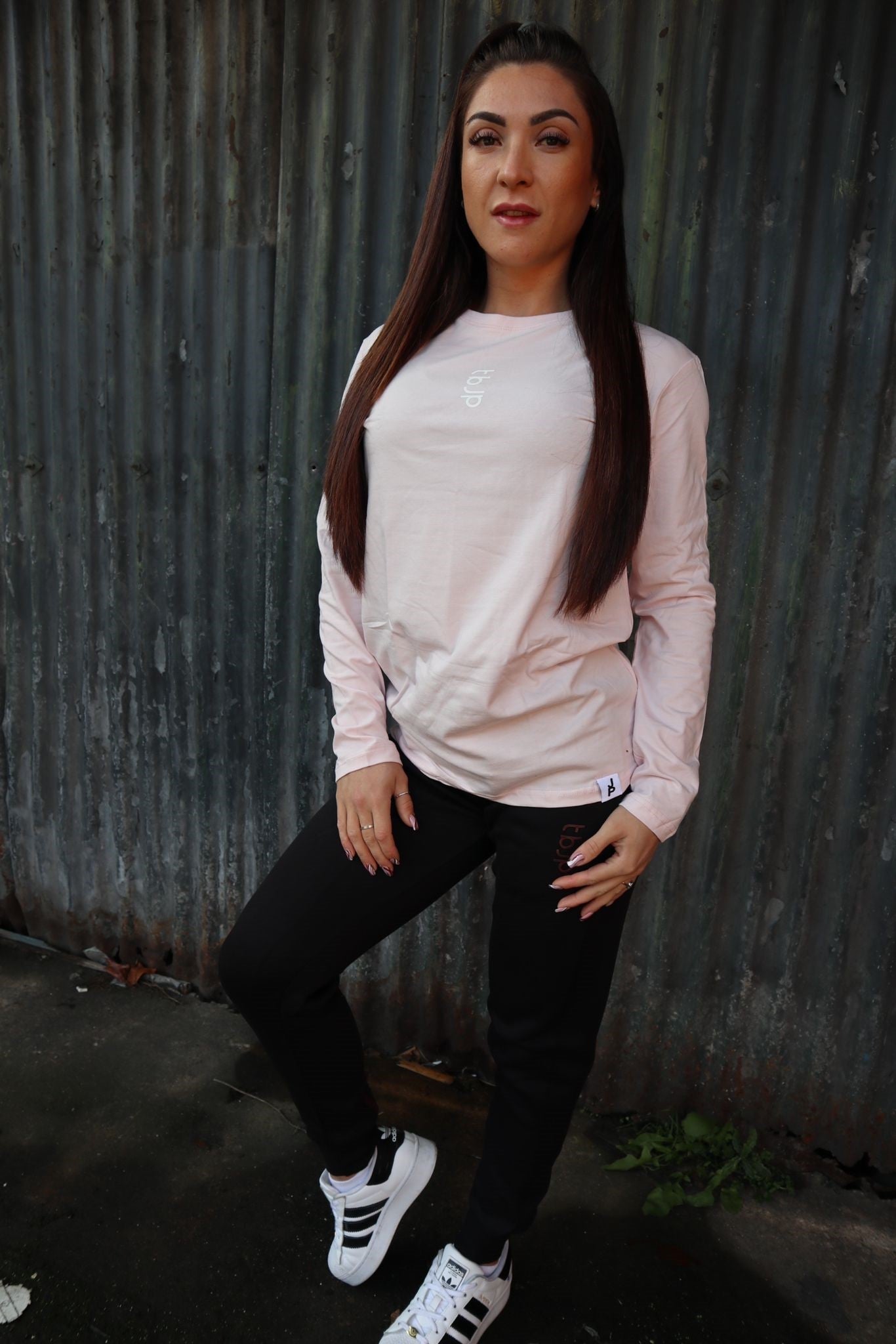 
                  
                    Long Sleeved Pastel Pink Tee with Sideways Logo
                  
                